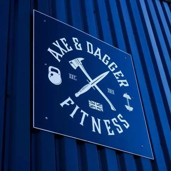 The Axe & Dagger Fitness sign on the gym building at Weston Lawns, Bulkington